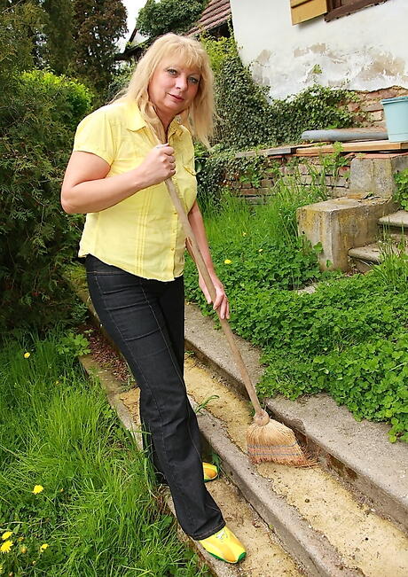 Stunning mature Rita in hot undies baring big boobs and toying outdoor