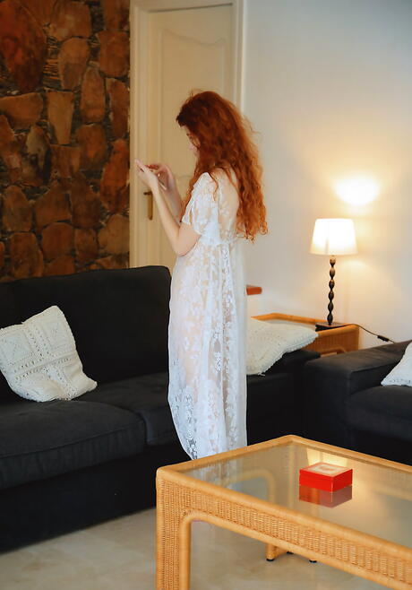 Slim red-haired youthful Adel C in underwear shows her butt and masturbates 